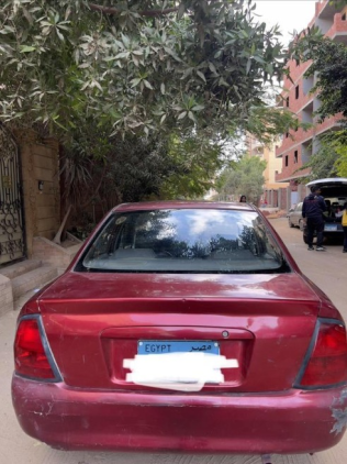 مازدا 323 2000 أحمر يدوي مستعملة للبيع في 6 أكتوبر
