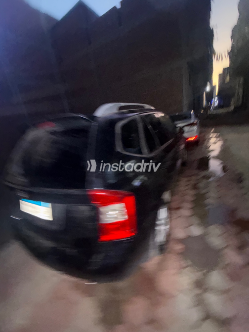 Kia Cadenza 2013 Black Automatic Used for Sale in Gharbia - 6