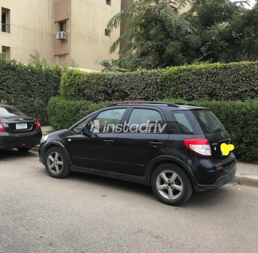 سوزوكى Sx 4 2009 أسود أوتوماتيك مستعملة للبيع في الإسكندرية - 2