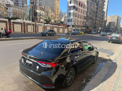 تويوتا كورولا 2021 أسود أوتوماتيك مستعملة للبيع في الإسكندرية - 2