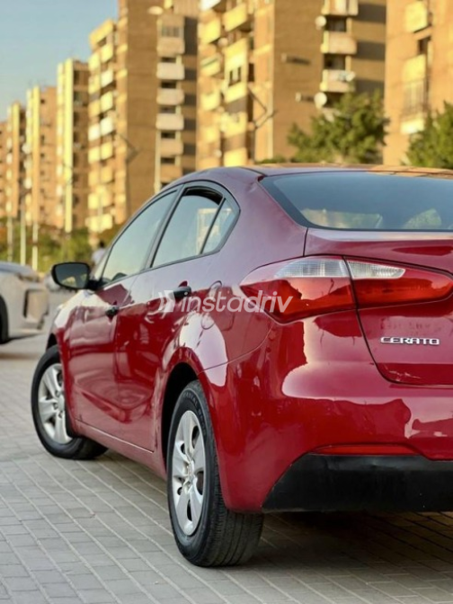 Kia Cerato 2014 Dark Red Automatic Used for Sale in Nasr city - 7