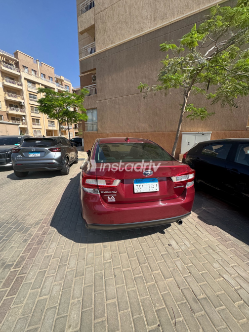سوبارو امبريزا 2019 أبيض أوتوماتيك مستعملة للبيع في مصر الجديدة - 6