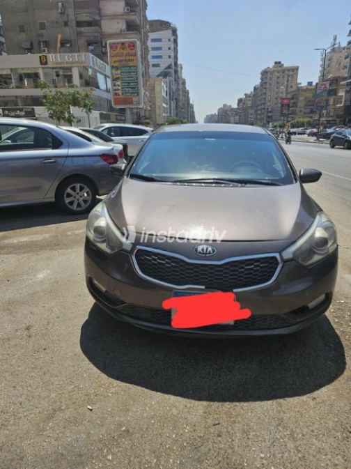 كيا سيراتو 2014 برونزي أوتوماتيك مستعملة للبيع في القاهرة الكبرى ( القاهرة - الجيزة) - 1