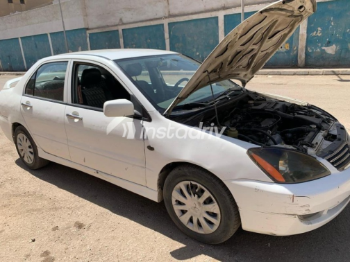 Mitsubishi Lancer Puma 2013 White Automatic Used for Sale in Greater Cairo ( Cairo + Giza) - 5