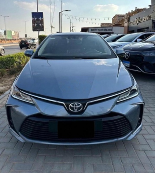 تويوتا كورولا 2021 رمادي أوتوماتيك مستعملة للبيع في مدينة الشيخ زايد
