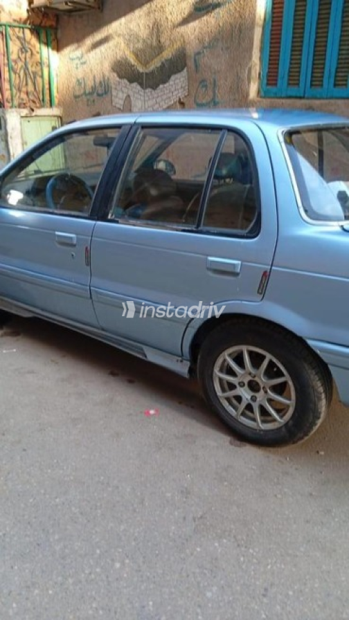 Mitsubishi Lancer 1990 Blue Manual Used for Sale in Nasr city - 2