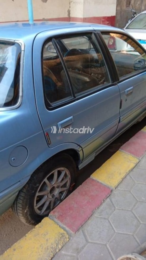 Mitsubishi Lancer 1990 Blue Manual Used for Sale in Nasr city - 3