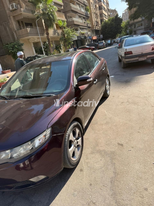 كيا سيراتو 2010 أبيض أوتوماتيك مستعملة للبيع في الجيزة - 1