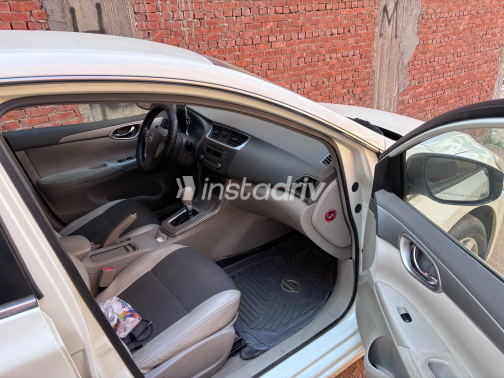 Nissan Sentra 2015 White Automatic Used for Sale in Heliopolis - 6