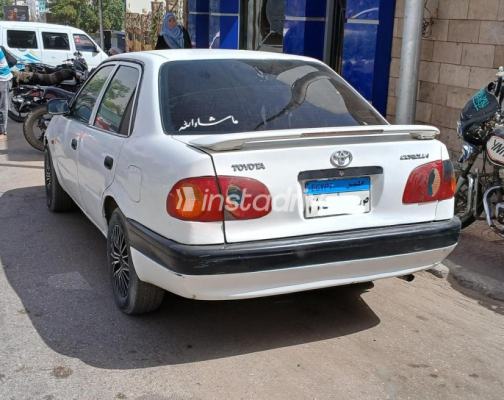 تويوتا كورولا 1999 أبيض أوتوماتيك مستعملة للبيع في أسوان - 6