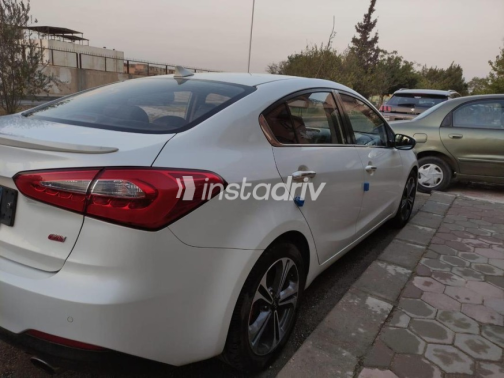 كيا K3 2013 أبيض أوتوماتيك مستعملة للبيع في العبور - 1