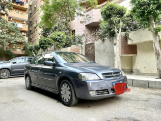 اوبل أسترا 2005 رمادي أوتوماتيك مستعملة للبيع في مدينة الشيخ زايد