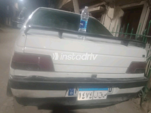 بيجو 405 1994 أبيض يدوي مستعملة للبيع في عين شمس - 2