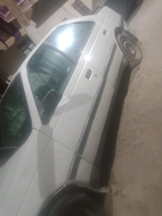 بيجو 405 1994 أبيض يدوي مستعملة للبيع في عين شمس