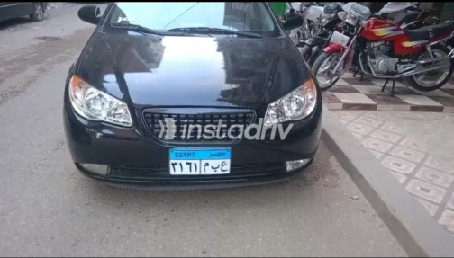 هيونداي إلنترا اتش دى 2010 أسود أوتوماتيك مستعملة للبيع في المحلة - 1