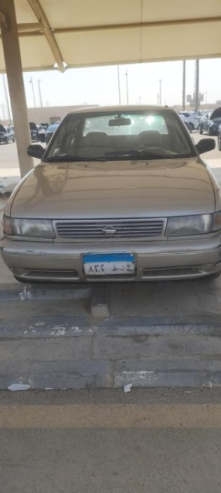 نيسان صنى 1994 ذهبي يدوي مستعملة للبيع في القاهرة