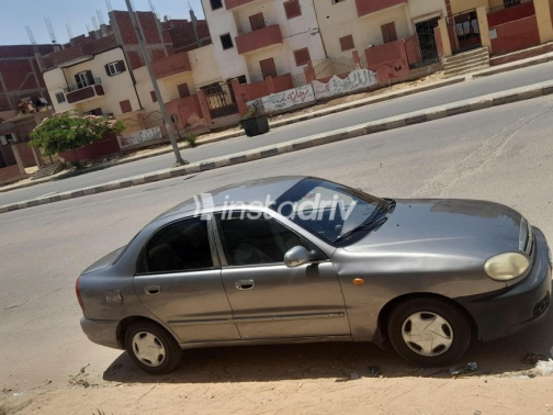 شيفروليه لانوس 2014 أبيض يدوي مستعملة للبيع في العاشر من رمضان - 1