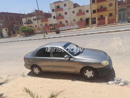 شيفروليه لانوس 2014 أبيض يدوي مستعملة للبيع في العاشر من رمضان - 3
