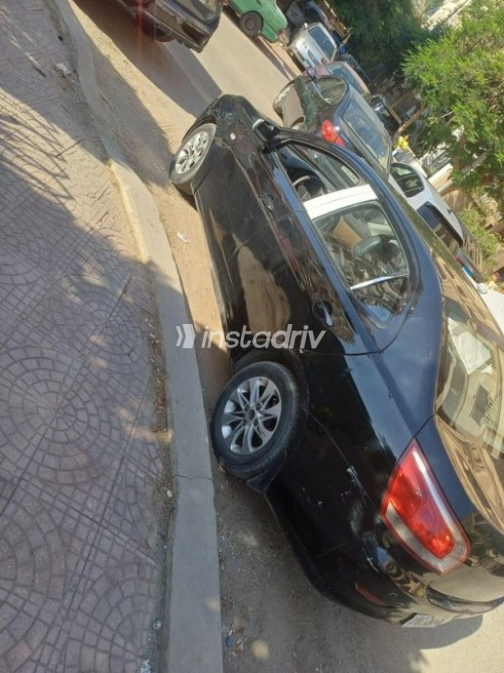 شيفروليه أوبترا 2015 أسود أوتوماتيك مستعملة للبيع في القاهرة - 7