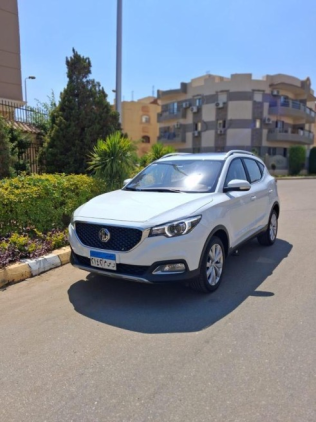 ام جى ZS EV 2025 أبيض أوتوماتيك مستعملة للبيع في مدينة الشيخ زايد