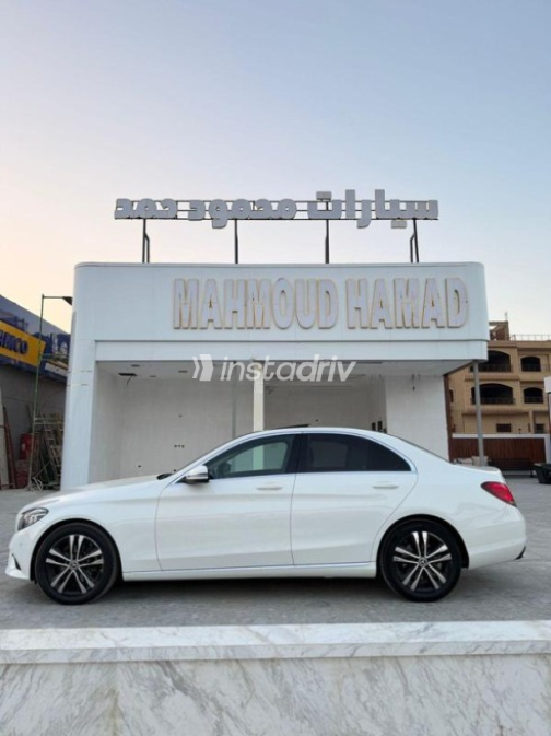Mercedes C 200 2019 White Automatic Used for Sale in Sheikh Zayed City - 2
