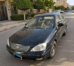 نيسان صنى 2009 أسود أوتوماتيك مستعملة للبيع في حدائق اكتوبر