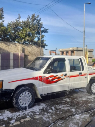 ميتسوبيشي L 200 2003 أبيض يدوي مستعملة للبيع في الدلنجات