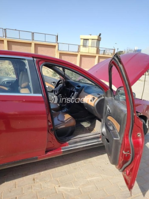 شيفروليه أوبترا 2015 أحمر غامق أوتوماتيك مستعملة للبيع في القاهرة - 9