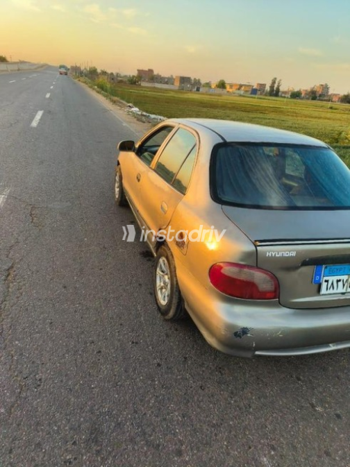 هيونداي اكسنت 2005 ذهبي يدوي مستعملة للبيع في المحلة - 6