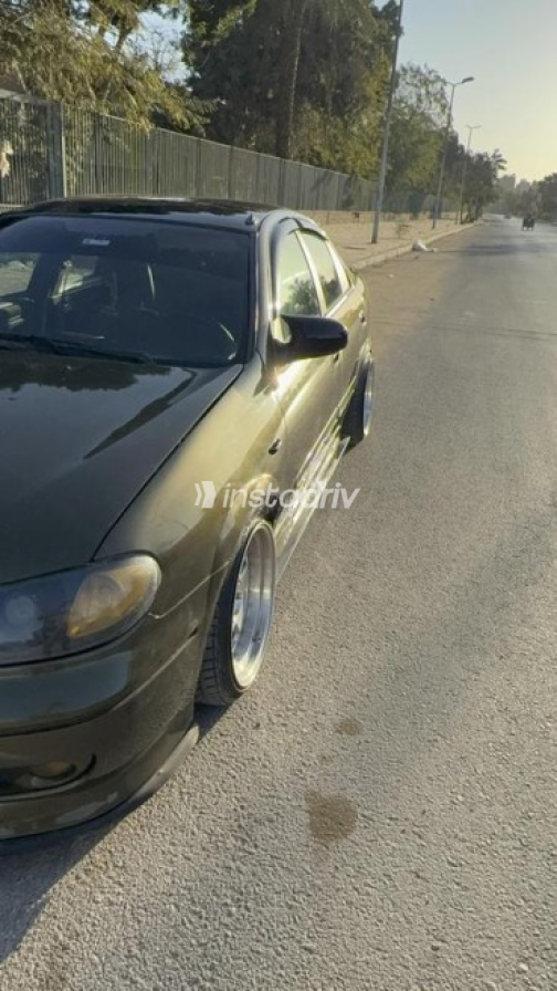 نيسان صنى 2008 أبيض أوتوماتيك مستعملة للبيع في أسيوط - 9