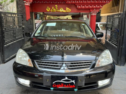 ميتسوبيشي لانسر 2006 أسود أوتوماتيك مستعملة للبيع في مدينة نصر - 1