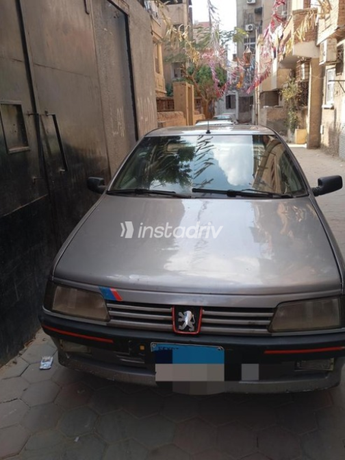 بيجو 405 1989 بني يدوي مستعملة للبيع في القاهرة - 1