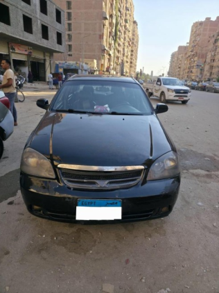 شيفروليه أوبترا 2009 أسود أوتوماتيك مستعملة للبيع في القاهرة