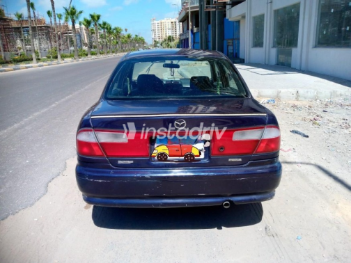 مازدا 323 1997 أزرق يدوي مستعملة للبيع في الإسكندرية - 1