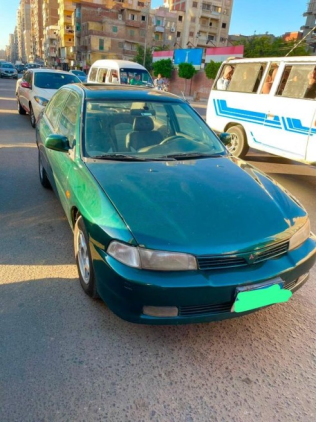 ميتسوبيشي لانسر كرستالة 1998 أبيض يدوي مستعملة للبيع في الإسكندرية