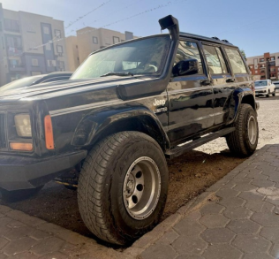 جيب جراند شيروكي 1998 أسود أوتوماتيك مستعملة للبيع في الغردقة