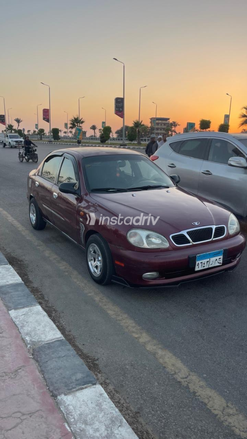 دايو لانوس 2 2000 أبيض يدوي مستعملة للبيع في دمياط - 5