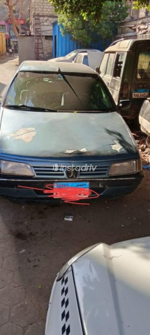 بيجو 405 2000 أبيض يدوي مستعملة للبيع في القاهرة - 1