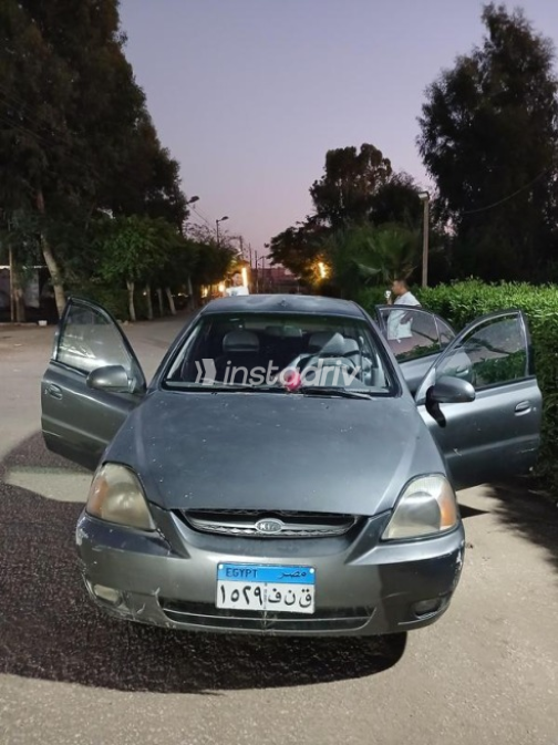 كيا ريو 2004 رمادي غامق يدوي مستعملة للبيع في بنها - 1