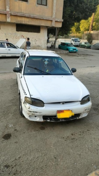هيونداي اكسنت 2005 أبيض يدوي مستعملة للبيع في إمبابة