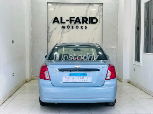 شيفروليه أوبترا 2011 أبيض أوتوماتيك مستعملة للبيع في الإسكندرية - 3