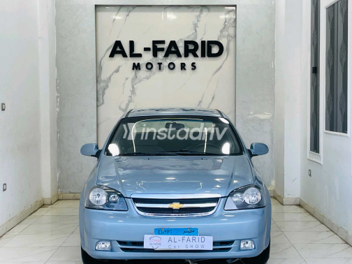 شيفروليه أوبترا 2011 أبيض أوتوماتيك مستعملة للبيع في الإسكندرية - 4