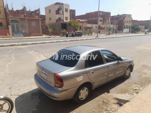 شيفروليه لانوس 2014 أبيض يدوي مستعملة للبيع في العاشر من رمضان - 3