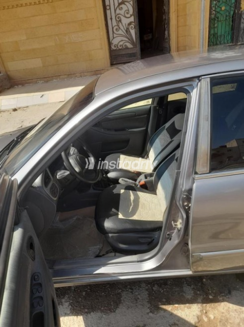 شيفروليه لانوس 2014 أبيض يدوي مستعملة للبيع في العاشر من رمضان - 6