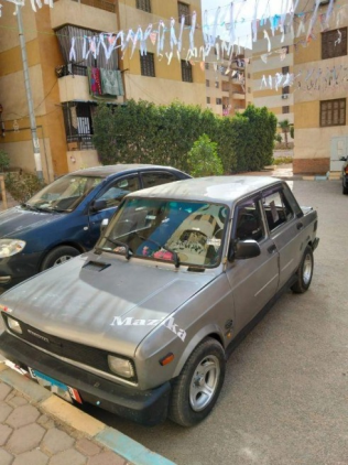 فيات 128 2006 رمادي يدوي مستعملة للبيع في حدائق اكتوبر