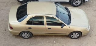هيونداي اكسنت 2000 برونزي يدوي مستعملة للبيع في المنصورة