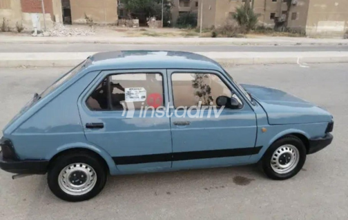 فيات 127 1986 أزرق يدوي مستعملة للبيع في شبرا - 1