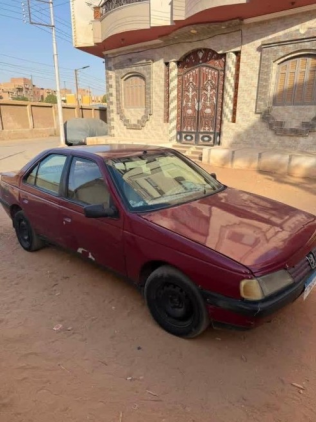 بيجو 405 1995 أحمر غامق يدوي مستعملة للبيع في سوهاج