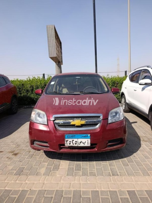 Chevrolet Aveo 2013 Dark Red Automatic Used for Sale in Nasr city - 1