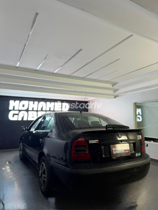 Skoda Octavia A4 2009 Black Manual Used for Sale in Heliopolis - 1